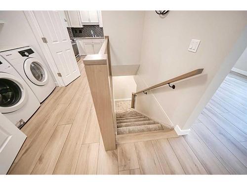 56 Riverview Drive Se, Calgary, AB - Indoor Photo Showing Laundry Room