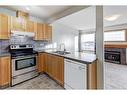 39 Covemeadow Manor Ne, Calgary, AB  - Indoor Photo Showing Kitchen With Double Sink 