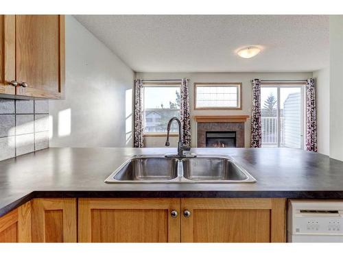 39 Covemeadow Manor Ne, Calgary, AB - Indoor Photo Showing Kitchen With Double Sink