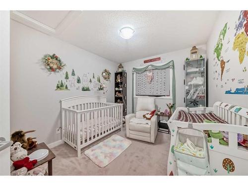 198 Copperpond Street Se, Calgary, AB - Indoor Photo Showing Bedroom