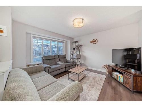 198 Copperpond Street Se, Calgary, AB - Indoor Photo Showing Living Room