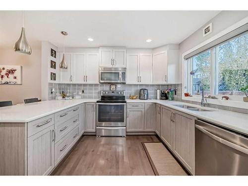 198 Copperpond Street Se, Calgary, AB - Indoor Photo Showing Kitchen With Stainless Steel Kitchen With Double Sink