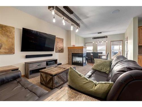 66 Kincora Glen Rise Nw, Calgary, AB - Indoor Photo Showing Living Room With Fireplace