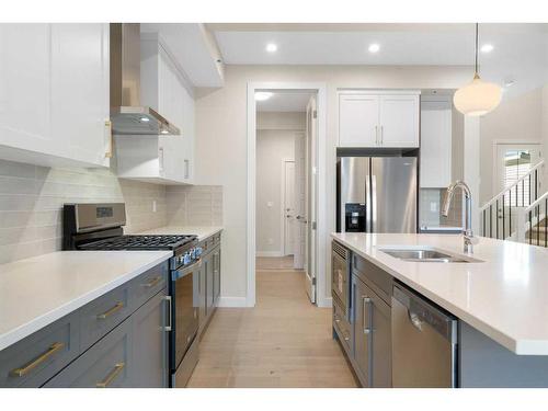 447 Crimson Ridge Place Nw, Calgary, AB - Indoor Photo Showing Kitchen With Stainless Steel Kitchen With Double Sink With Upgraded Kitchen