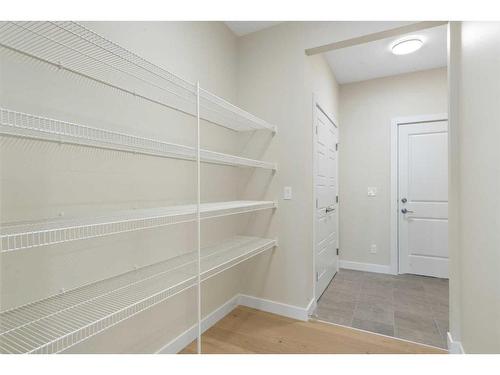 447 Crimson Ridge Place Nw, Calgary, AB - Indoor With Storage