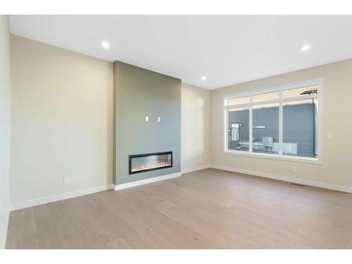 447 Crimson Ridge Place Nw, Calgary, AB - Indoor With Fireplace