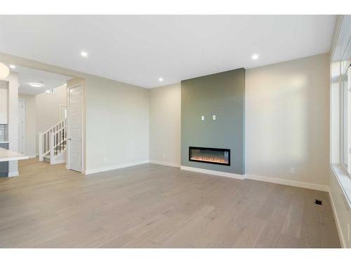 447 Crimson Ridge Place Nw, Calgary, AB - Indoor With Fireplace