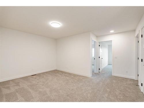 211 Silver Spruce Grove Sw, Calgary, AB - Indoor Photo Showing Other Room