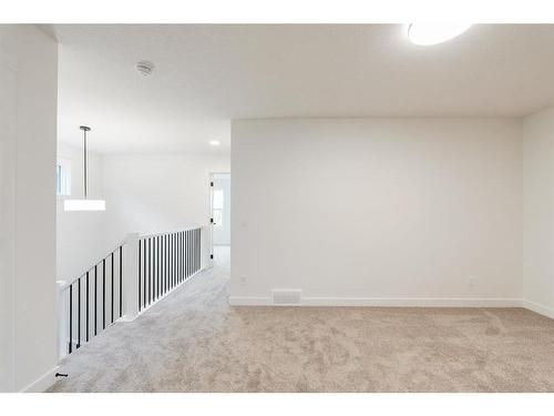 211 Silver Spruce Grove Sw, Calgary, AB - Indoor Photo Showing Other Room