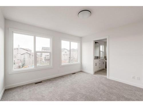 211 Silver Spruce Grove Sw, Calgary, AB - Indoor Photo Showing Other Room