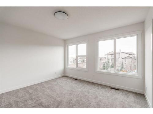 211 Silver Spruce Grove Sw, Calgary, AB - Indoor Photo Showing Other Room