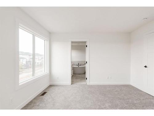 211 Silver Spruce Grove Sw, Calgary, AB - Indoor Photo Showing Other Room