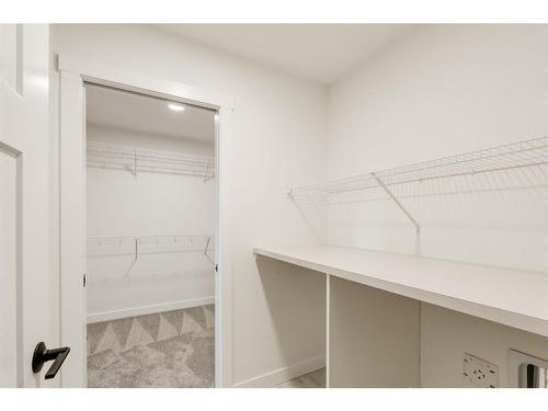 211 Silver Spruce Grove Sw, Calgary, AB - Indoor With Storage