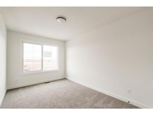 211 Silver Spruce Grove Sw, Calgary, AB - Indoor Photo Showing Other Room