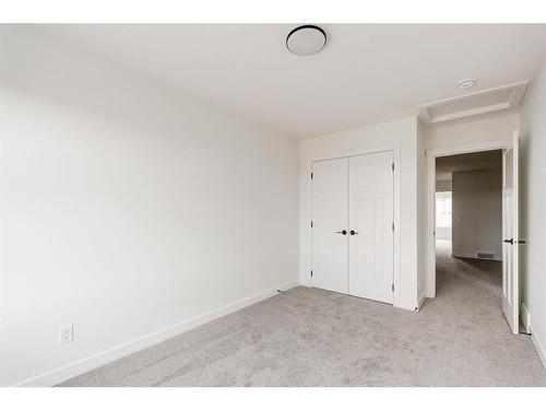 211 Silver Spruce Grove Sw, Calgary, AB - Indoor Photo Showing Other Room