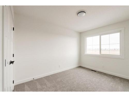 211 Silver Spruce Grove Sw, Calgary, AB - Indoor Photo Showing Other Room