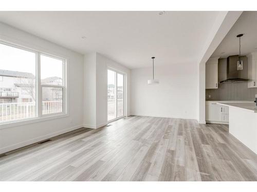 211 Silver Spruce Grove Sw, Calgary, AB - Indoor Photo Showing Kitchen With Double Sink