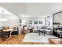 212 Deerview Drive Se, Calgary, AB  - Indoor Photo Showing Living Room 