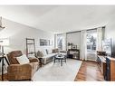 212 Deerview Drive Se, Calgary, AB  - Indoor Photo Showing Living Room 