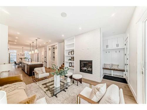 1613 32 Avenue Sw, Calgary, AB - Indoor Photo Showing Living Room With Fireplace