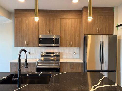 48 Sora Terrace Se, Calgary, AB - Indoor Photo Showing Kitchen