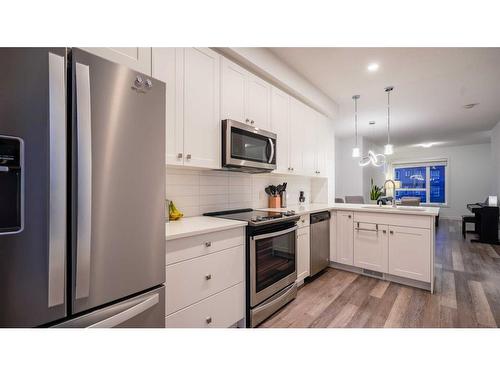 610-15 Evancrest Park Nw, Calgary, AB - Indoor Photo Showing Kitchen With Stainless Steel Kitchen With Upgraded Kitchen