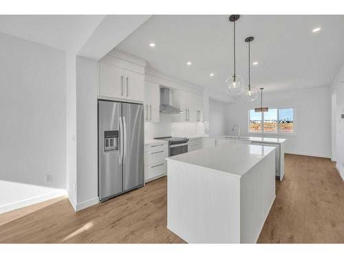 612 Dawson Drive, Chestermere, AB - Indoor Photo Showing Kitchen With Upgraded Kitchen