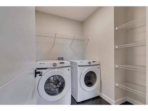 148 Sora Terrace Se, Calgary, AB - Indoor Photo Showing Laundry Room