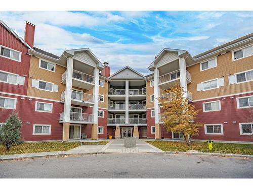 1417-10 Prestwick Bay Se, Calgary, AB - Outdoor With Balcony With Facade