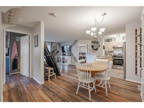 1417-10 Prestwick Bay Se, Calgary, AB - Indoor Photo Showing Dining Room