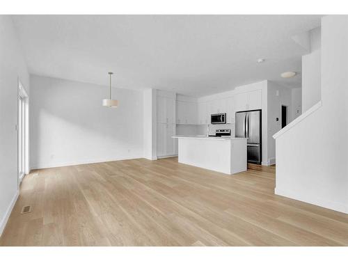 2051 Fowler Road Sw, Airdrie, AB - Indoor Photo Showing Kitchen