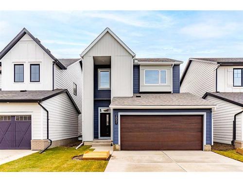 2051 Fowler Road Sw, Airdrie, AB - Outdoor With Facade