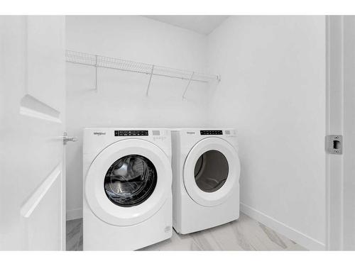 2051 Fowler Road Sw, Airdrie, AB - Indoor Photo Showing Laundry Room