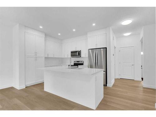 2051 Fowler Road Sw, Airdrie, AB - Indoor Photo Showing Kitchen With Stainless Steel Kitchen With Upgraded Kitchen