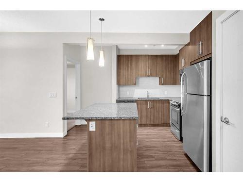 108-8 Sage Hill Terrace Nw, Calgary, AB - Indoor Photo Showing Kitchen With Stainless Steel Kitchen