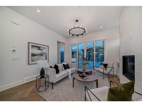 4129 19 Street Sw, Calgary, AB - Indoor Photo Showing Living Room With Fireplace