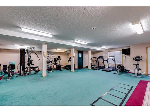 231-7229 Sierra Morena Boulevard Sw, Calgary, AB - Indoor Photo Showing Gym Room