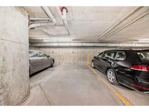 2318-2371 Eversyde Avenue Sw, Calgary, AB - Indoor Photo Showing Garage