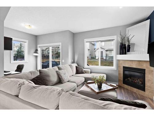 72-300 Marina Drive, Chestermere, AB - Indoor Photo Showing Living Room With Fireplace