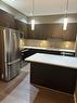 210-22 Auburn Bay Link Se, Calgary, AB  - Indoor Photo Showing Kitchen With Stainless Steel Kitchen With Upgraded Kitchen 