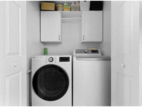 15-900 Allen Street Se, Airdrie, AB - Indoor Photo Showing Laundry Room