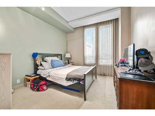 120-8710 Horton Road Sw, Calgary, AB - Indoor Photo Showing Bedroom