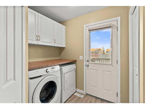 32 Panora Close Nw, Calgary, AB - Indoor Photo Showing Laundry Room