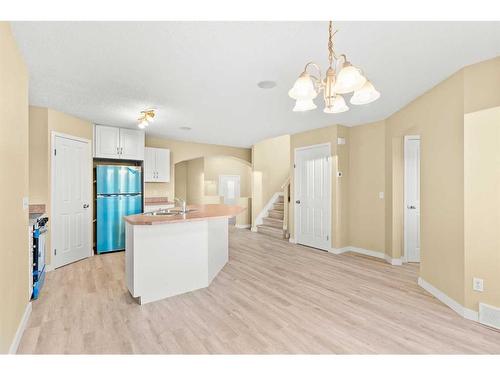 32 Panora Close Nw, Calgary, AB - Indoor Photo Showing Kitchen With Double Sink