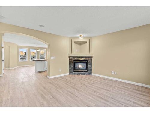 32 Panora Close Nw, Calgary, AB - Indoor Photo Showing Living Room With Fireplace