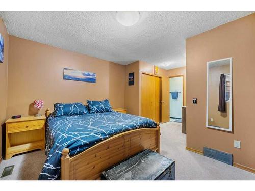 52 Hawkcliff Way Nw, Calgary, AB - Indoor Photo Showing Bedroom