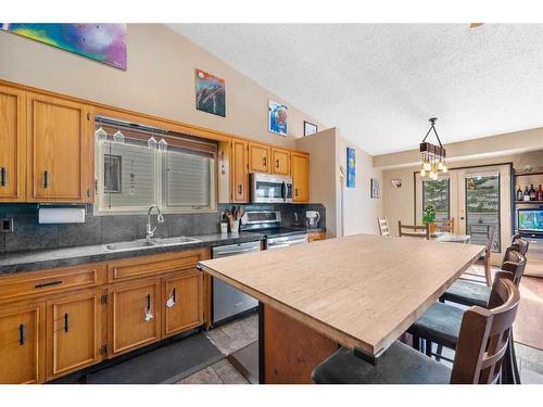 52 Hawkcliff Way Nw, Calgary, AB - Indoor Photo Showing Kitchen With Double Sink