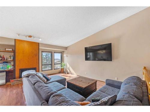 52 Hawkcliff Way Nw, Calgary, AB - Indoor Photo Showing Living Room