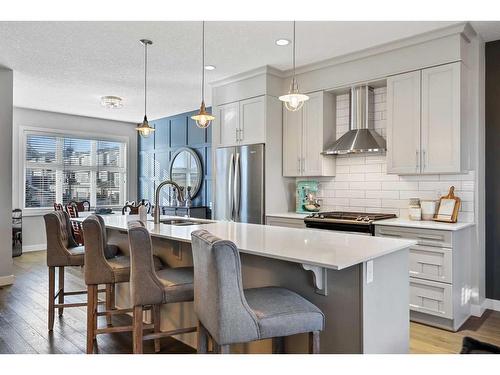 104 Silverado Plains Park Sw, Calgary, AB - Indoor Photo Showing Kitchen With Stainless Steel Kitchen With Upgraded Kitchen