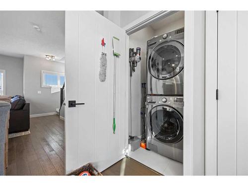 104 Silverado Plains Park Sw, Calgary, AB - Indoor Photo Showing Laundry Room